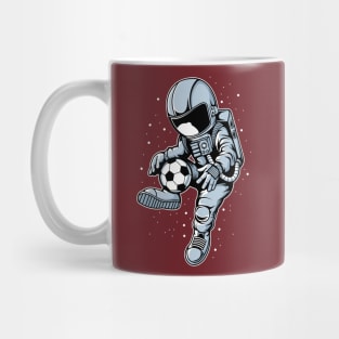 astronaut playing soccer Mug